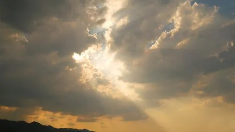 Sky Clouds and Light rays Stock Photos