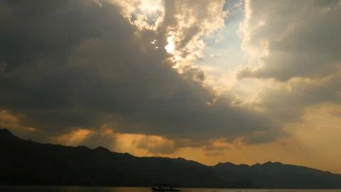 Sky Clouds and Light rays Stock Photos