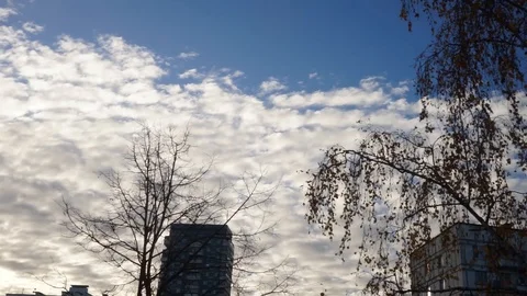 Sky with clouds and sun in the background of the city 2 Stock Footage 97537765