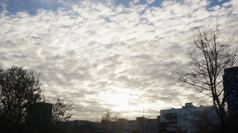Sky with clouds and sun in the background of the city 1 Stock Footage 97537770