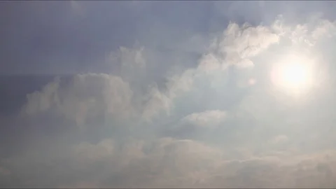 Sky with clouds and sun Stockbeeldmateriaal 102083754