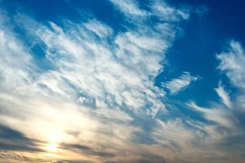 Sky with clouds and sun Stock Photos