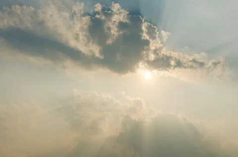 Sky with clouds and sun Stock Photos