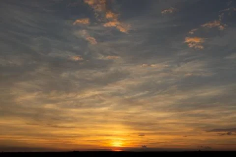 Sky with clouds and sun Stock Photos