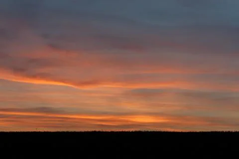 Sky with clouds and sun Stock Photos