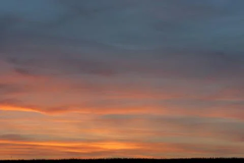 Sky with clouds and sun Stock Photos