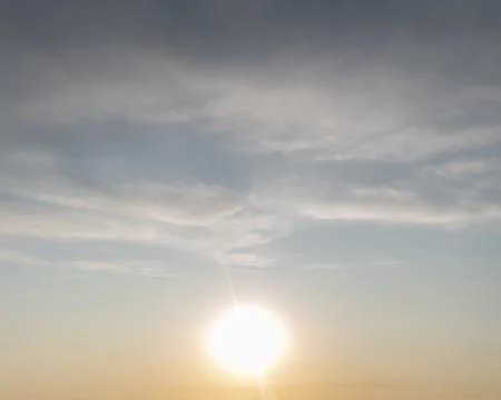 Sky with clouds and sun Stock Photos