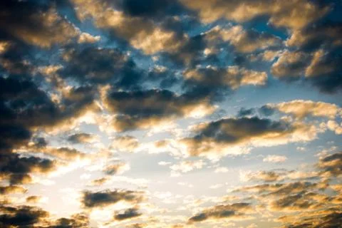 Sky with clouds and sun Stock Photos