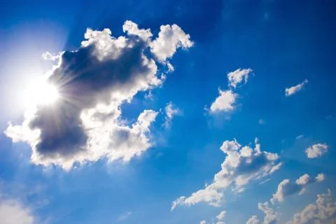 Sky with clouds and sun Stock Photos