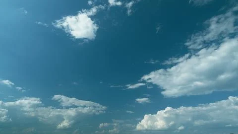 Sky With Clouds And Sun Rays. Altocumulus Clouds Fully Moving Across The Bright Stock Photos