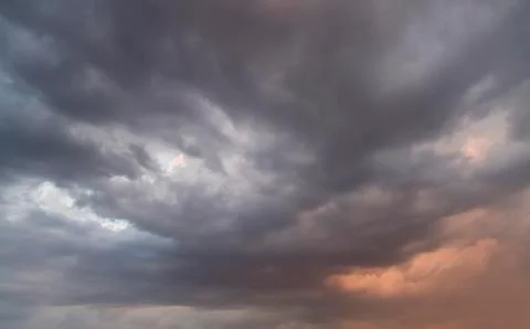 Sky with clouds and sunlight at sunset. colorful and cheerful, wallpaper or t Stock Photos