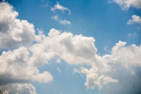 Sky clouds on a background of bright blue clear sky Foto stock