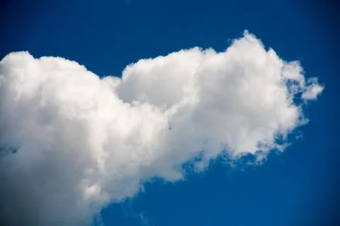 Sky clouds on a background of bright blue clear sky Stock Photos