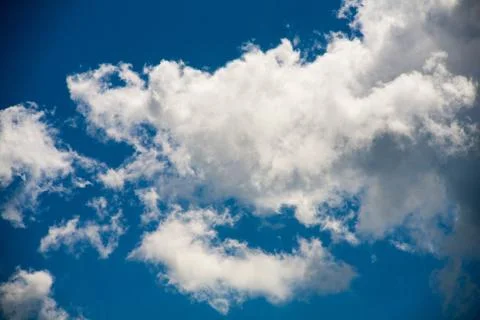 Sky clouds on a background of bright blue clear sky Foto stock