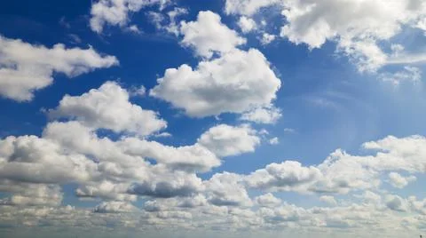 Sky clouds background. Cumulus clouds in blue sky. white whispy clouds and bl Stock Photos