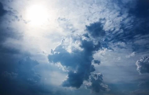Sky with clouds closing the sun Stock Photos