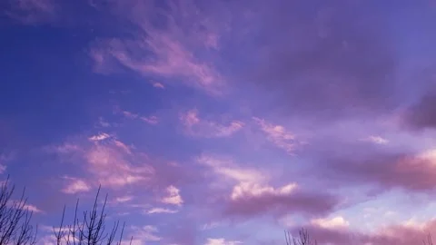 Sky with clouds at dawn, gently purple sunrise Stock Footage 166373645