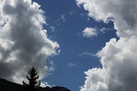 Sky with clouds mountain view horizontal background Stock Photos