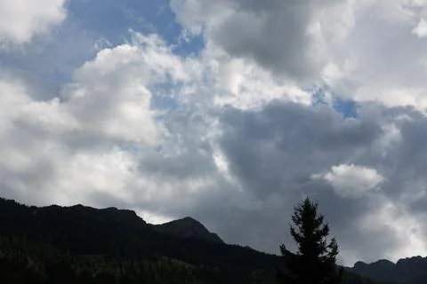Sky with clouds mountain view horizontal background Stock Photos