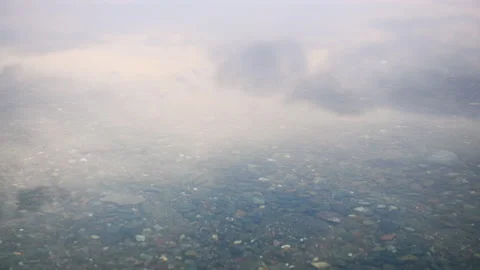 Sky with clouds reflected in the water surface. Video stock 150991762
