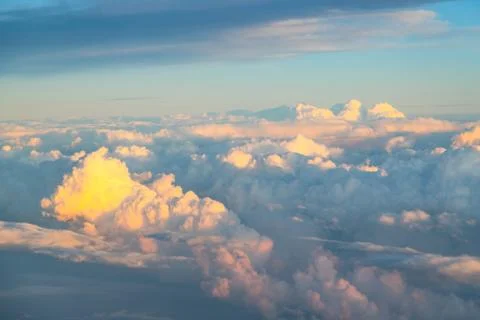 Sky with clouds in the setting sun. Stock Photos