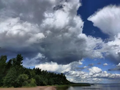 Sky, clouds, shore 4 Stock Photos