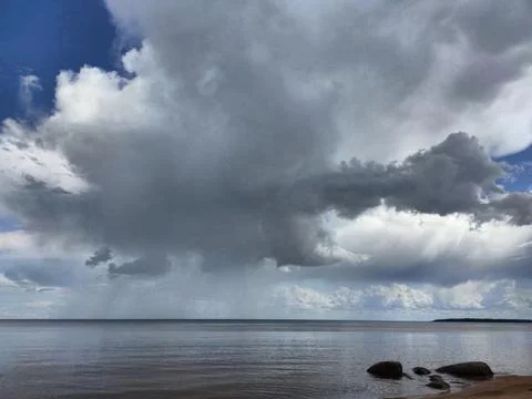 Sky, clouds, shore 5 Stock Photos