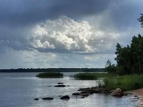 Sky, clouds, shore Stock Photos
