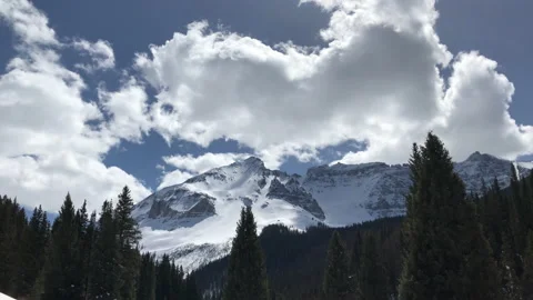 Sky clouds Sun Snow Pine Tree Video stock 156940268
