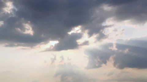 Sky with clouds. Sunlight beams down on the Earth. Cloud cover. Video stock 203791229