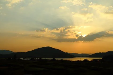Sky with clouds at sunset Stock Photos