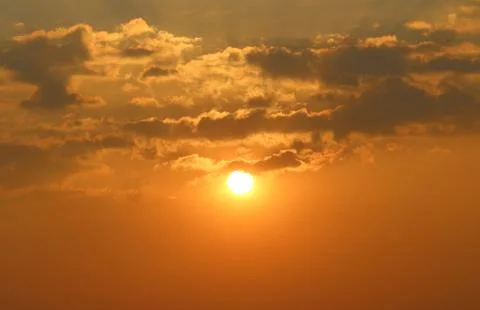 Sky with clouds at sunset Stock Photos