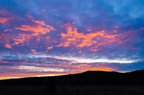 Sky with clouds at sunset Stock Photos