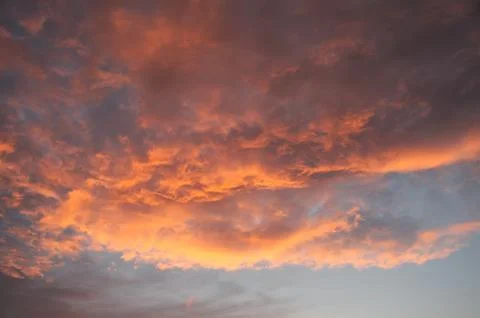 Sky with clouds at sunset Stock Photos