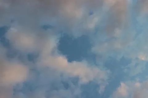 The sky in the clouds at sunset. Stock Photos