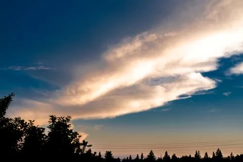Sky with clouds at sunset. Stock Photos