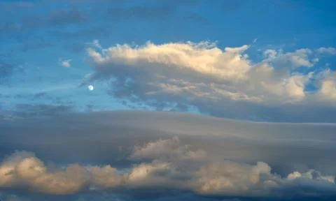 Sky with clouds at sunset. Stock Photos