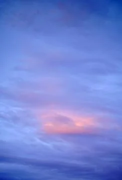 Sky with clouds at sunset. Stock Photos