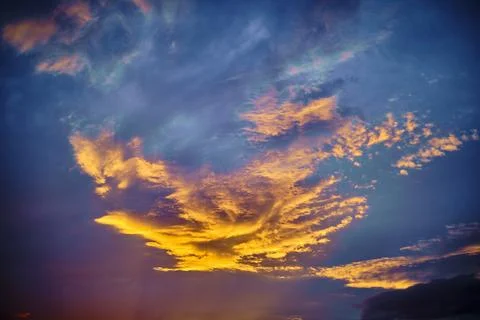 Sky with clouds at sunset. Stock Photos