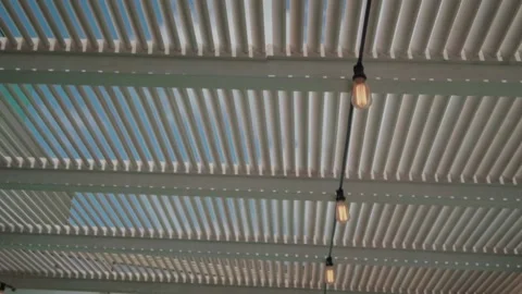 The sky, clouds through the cracks in the ceiling Stock Footage 147683714