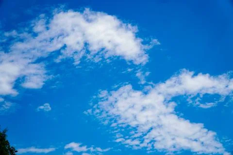 Sky in clouds, white clouds, blue sky noon sky, clouds over the mountains Stock Photos