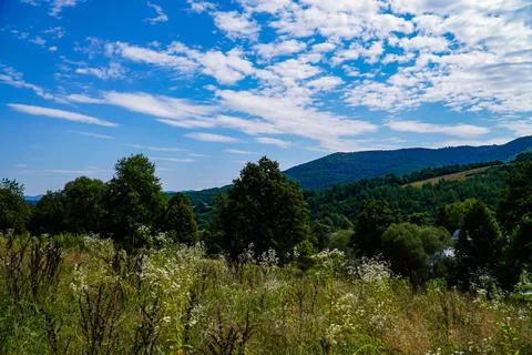 Sky in clouds, white clouds, blue sky noon sky, clouds over the mountains Stock Photos