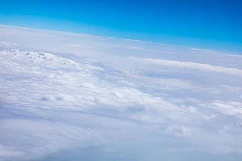 Sky cloudscape.Blue sky and white clouds on a sunny day.Aerial view. Stock Photos