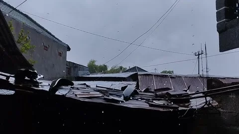 The sky is cloudy and it's raining in the afternoon Stock Footage 219300653