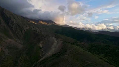 The sky is cloudy and the mountains are in the background Stock Footage 327907833