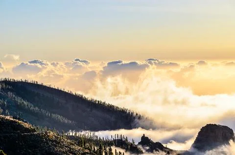 The sky is cloudy and the sun is setting Stock Photos