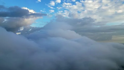 The sky is cloudy and the sun is shining through the clouds Video stock 332242843