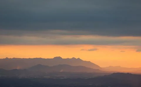Sky cloudy with Sunset over the mountains in the winter Stock-Fotos