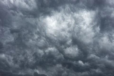 The sky is covered with black clouds. Stock Photos