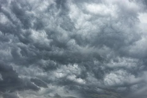 The sky is covered with black clouds. Stock Photos